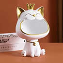 Estátua Decorativa de Gato, combina estética e funcionalidade, servindo também como organizador de objetos. Ideal para manter pequenos itens organizados com estilo, ela agrega charme e praticidade a qualquer ambiente, seja em casa ou no escritório. Seu design sofisticado é perfeito para quem valoriza decoração inteligente e organizada.