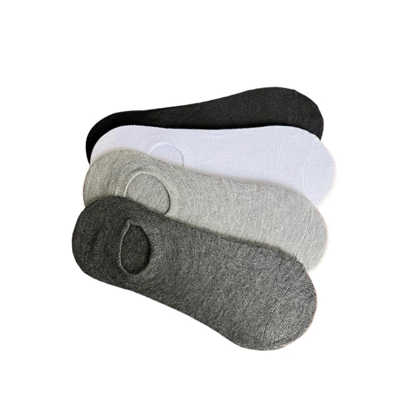 Kit 12 pares de meias sapatilha invisível unissex com silicone interno. Conforto, ajuste seguro e cores sortidas. Escolha já o seu e sinta a diferença!