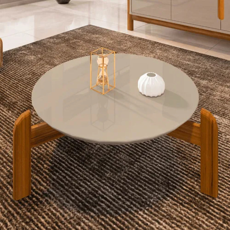 Mesa de Centro Redonda com Pés em Madeira Maciça é a escolha ideal para quem busca durabilidade e estilo em um único móvel. Seu design arredondado proporciona fluidez ao ambiente, enquanto os pés robustos garantem estabilidade e resistência. Perfeita como mesinha de apoio, ela combina funcionalidade e elegância, valorizando sua sala com um toque natural e sofisticado.