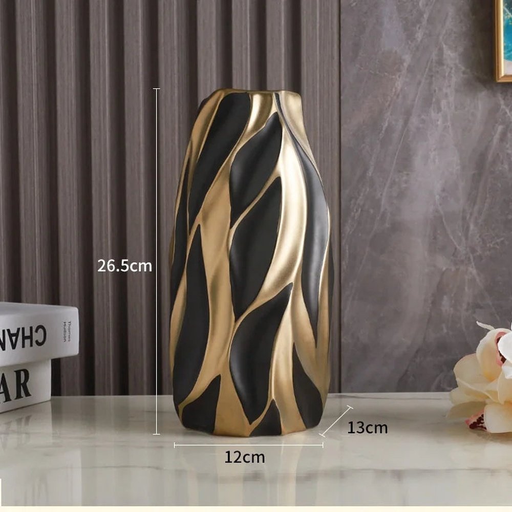 Vaso decorativo de cerâmica Elegance, combina design sofisticado com acabamento refinado, ideal para valorizar qualquer ambiente. Sua estrutura resistente e textura suave proporcionam durabilidade e um toque de requinte, tornando-o perfeito para exibir flores ou como peça decorativa independente. Um item versátil que eleva a estética do seu espaço com elegância e qualidade.