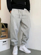 calça jogger masculina, calça moletom masculina, jogger slim masculina, calça academia masculina, calça confortável masculina, calça casual masculina, roupa masculina inverno, jogger masculina, calça com cordão, streetwear masculino